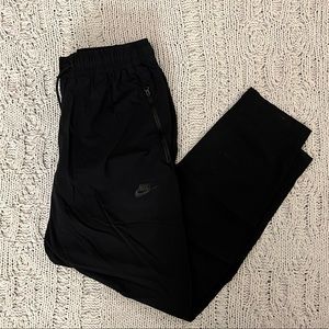 nike black tech woven pants